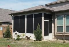 Tarrytown screen room designed with premium screen mesh and a low‑profile roofline for a clean, unobtrusive look.
