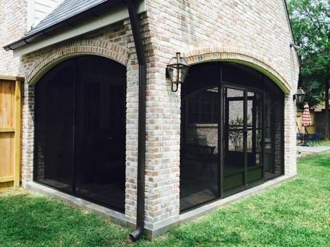 Bulverde screen room designed with a heavy‑duty aluminum structure and a fan‑ready center beam.