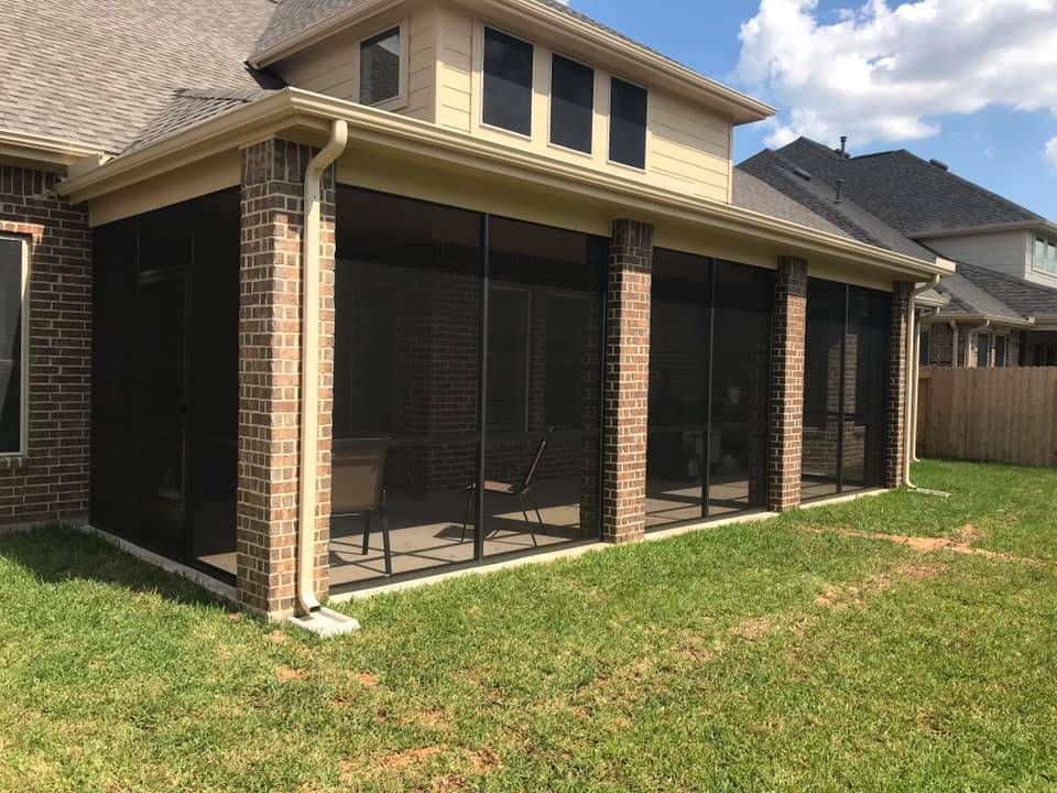 Screen enclosure installed on a backyard patio in Circle C Ranch