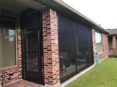 Helotes screen room designed with Hill Country‑style finishes and a heat‑reducing insulated roof.