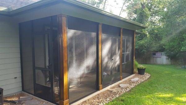 North San Antonio screen room designed with a bright insulated roof and full‑height screen walls for maximum shade and airflow.