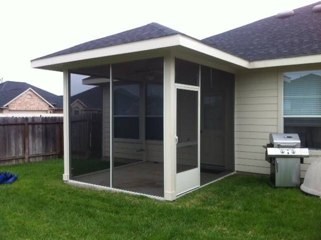 Screened backyard retreat with grill area in Seguin TX