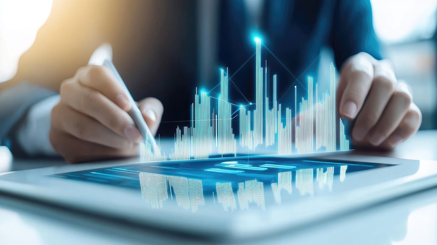 View of the man of a businessman using a tablet and a graph is coming out of the device. View of the man of a businessman using a tablet and a graph is coming out of the device.