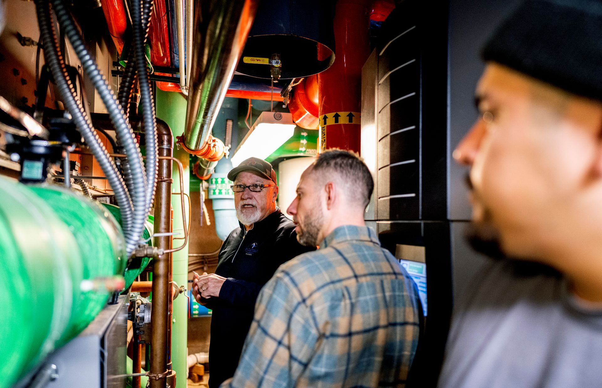 CORE staff member conducting a home energy assessment in Aspen, demonstrating their hands-on approach to climate solutions.