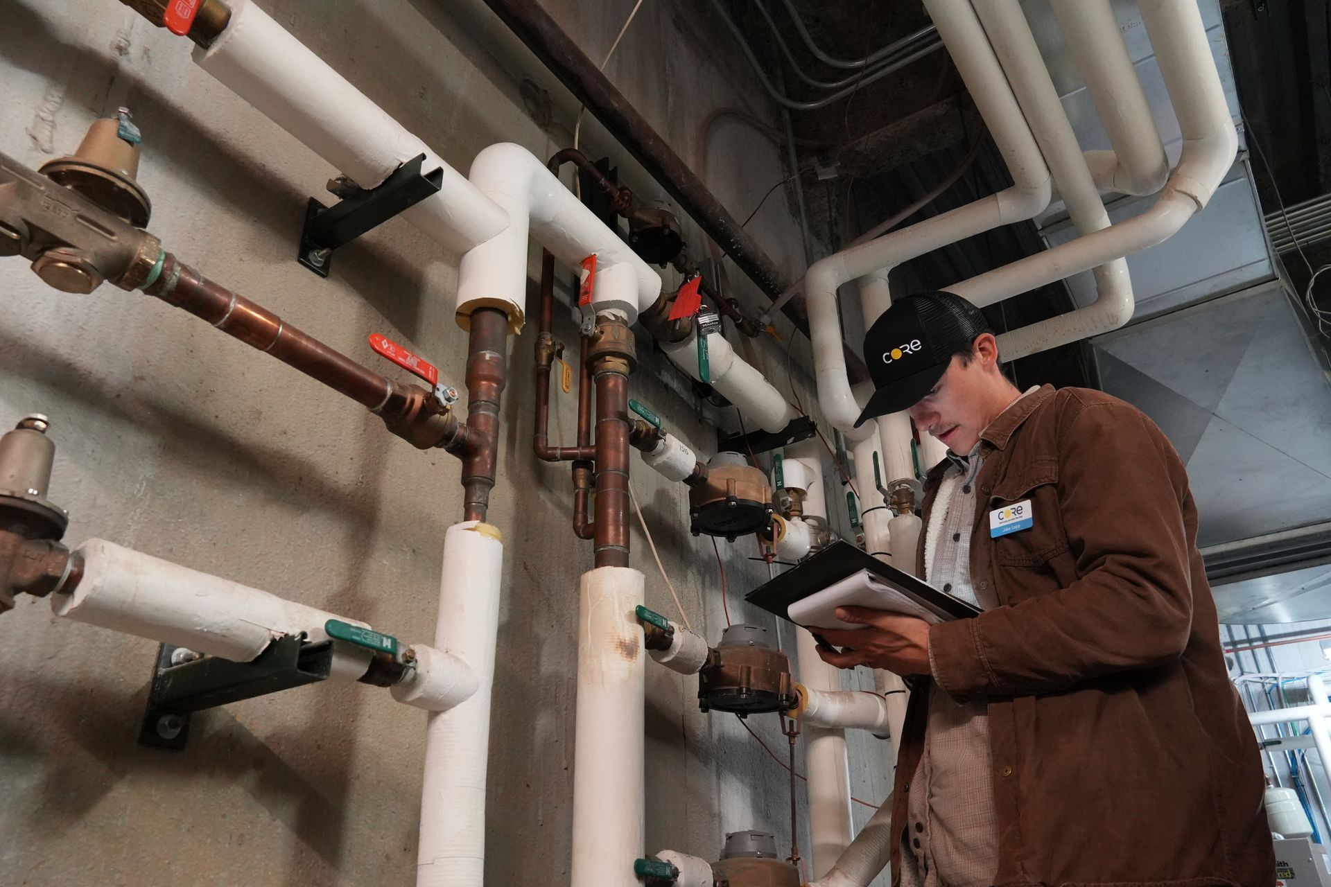 CORE staff member conducting a home energy assessment in Aspen, demonstrating their hands-on approach to climate solutions.