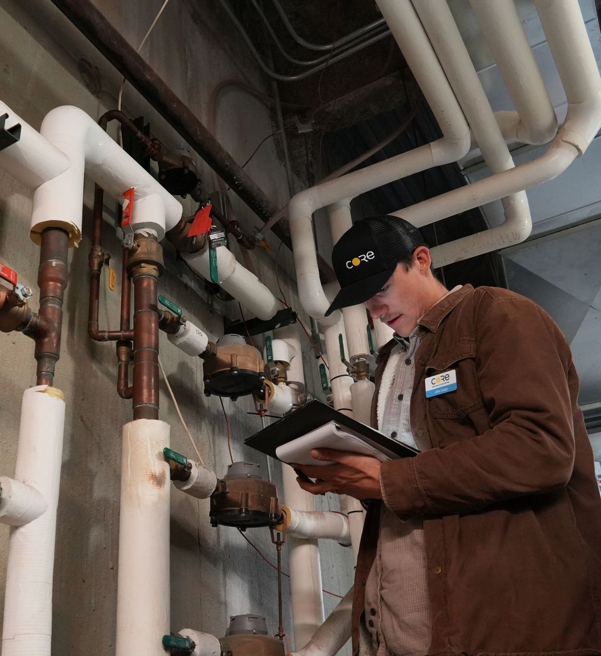 CORE staff member conducting a home energy assessment in Aspen, demonstrating their hands-on approach to climate solutions.