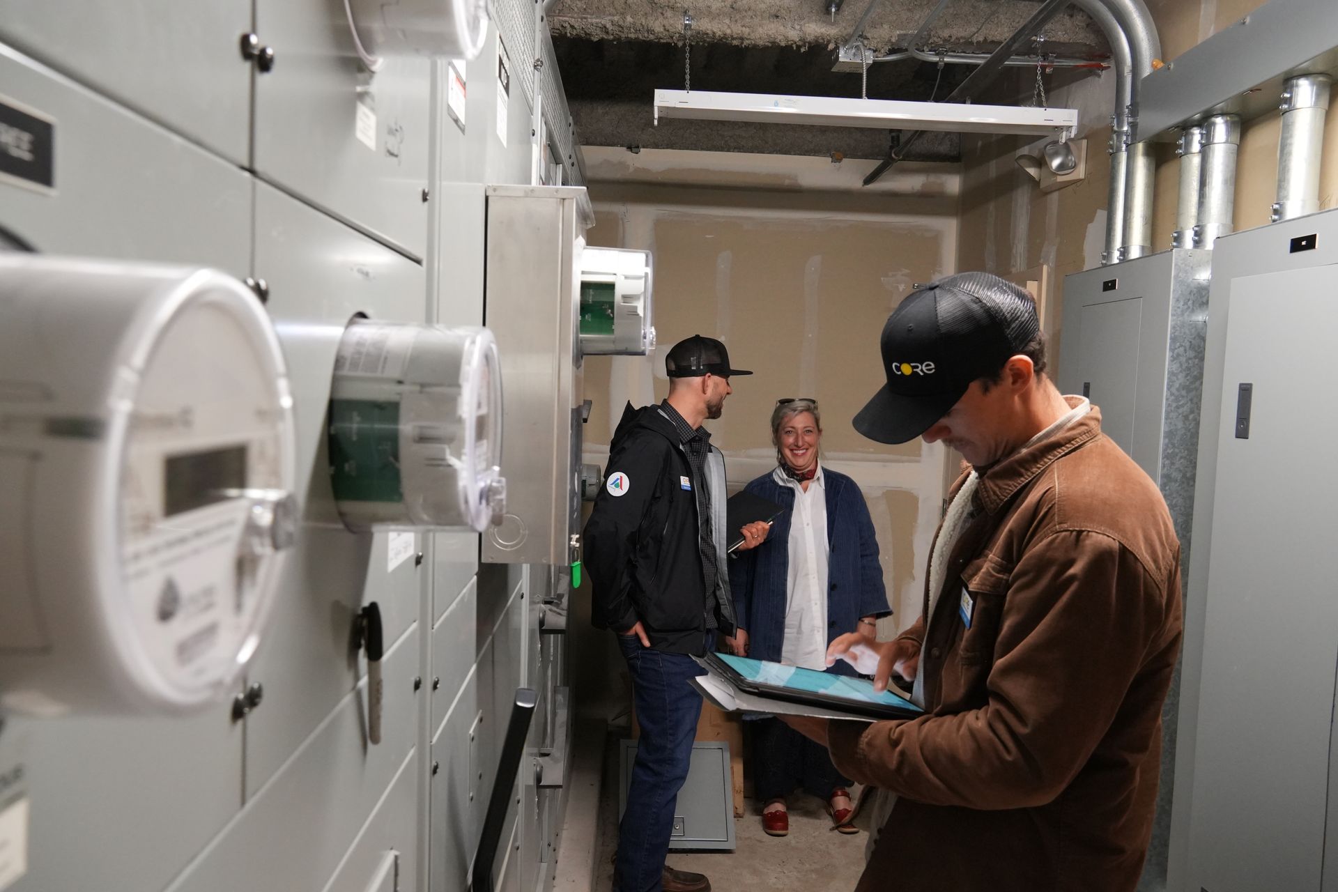 CORE staff member conducting a home energy assessment in Aspen, demonstrating their hands-on approach to climate solutions.
