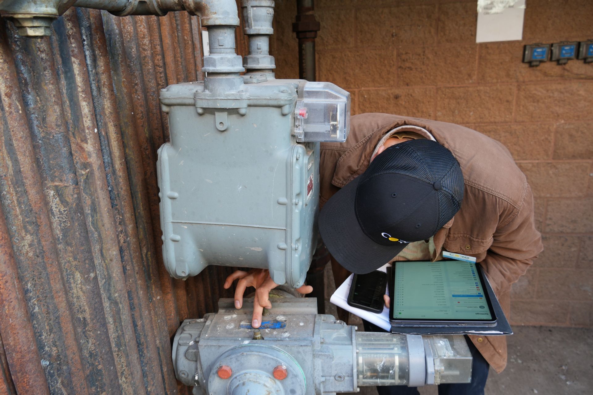 CORE staff member conducting a home energy assessment in Aspen, demonstrating their hands-on approach to climate solutions.