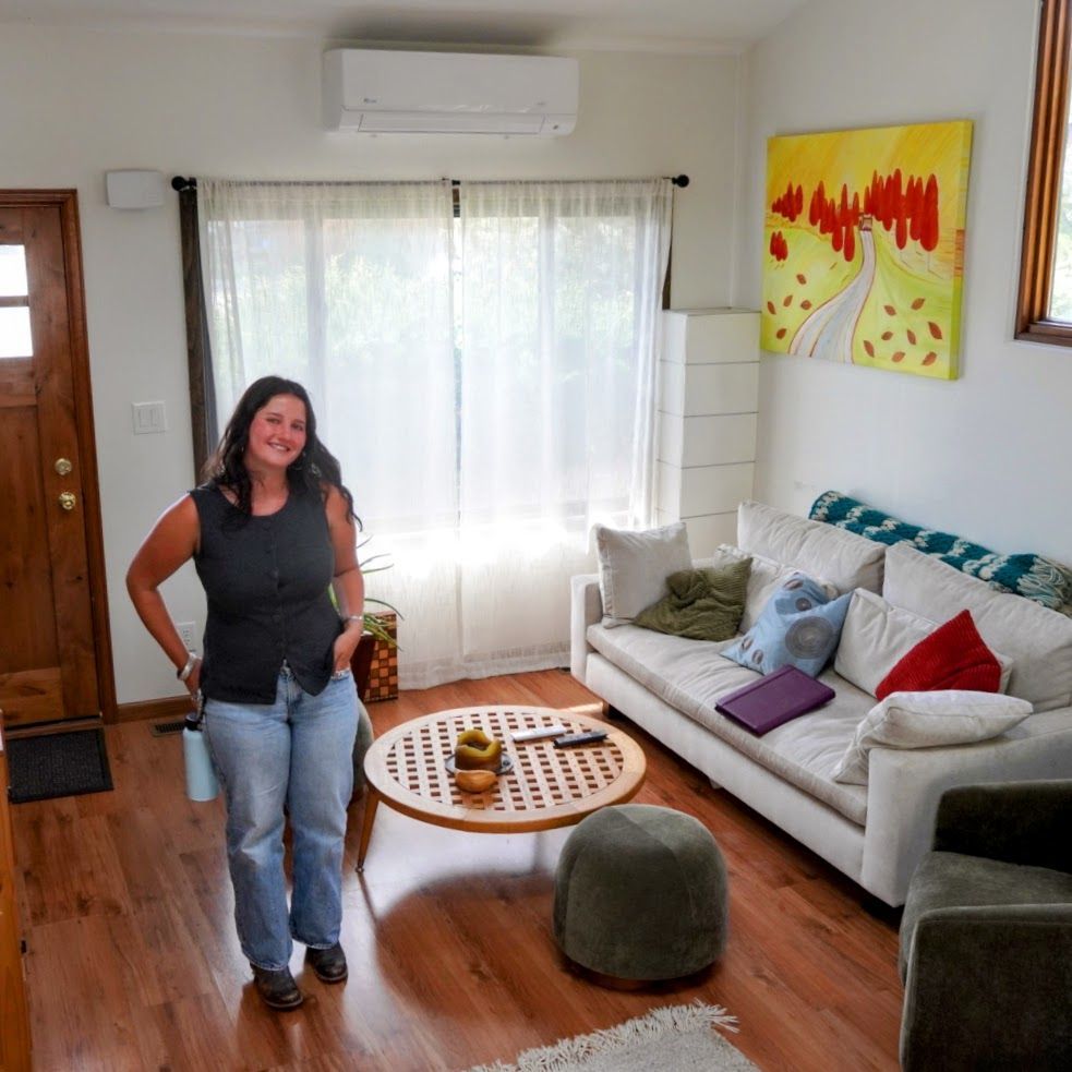 CORE staff member conducting a home energy assessment in Aspen, demonstrating their hands-on approach to climate solutions.
