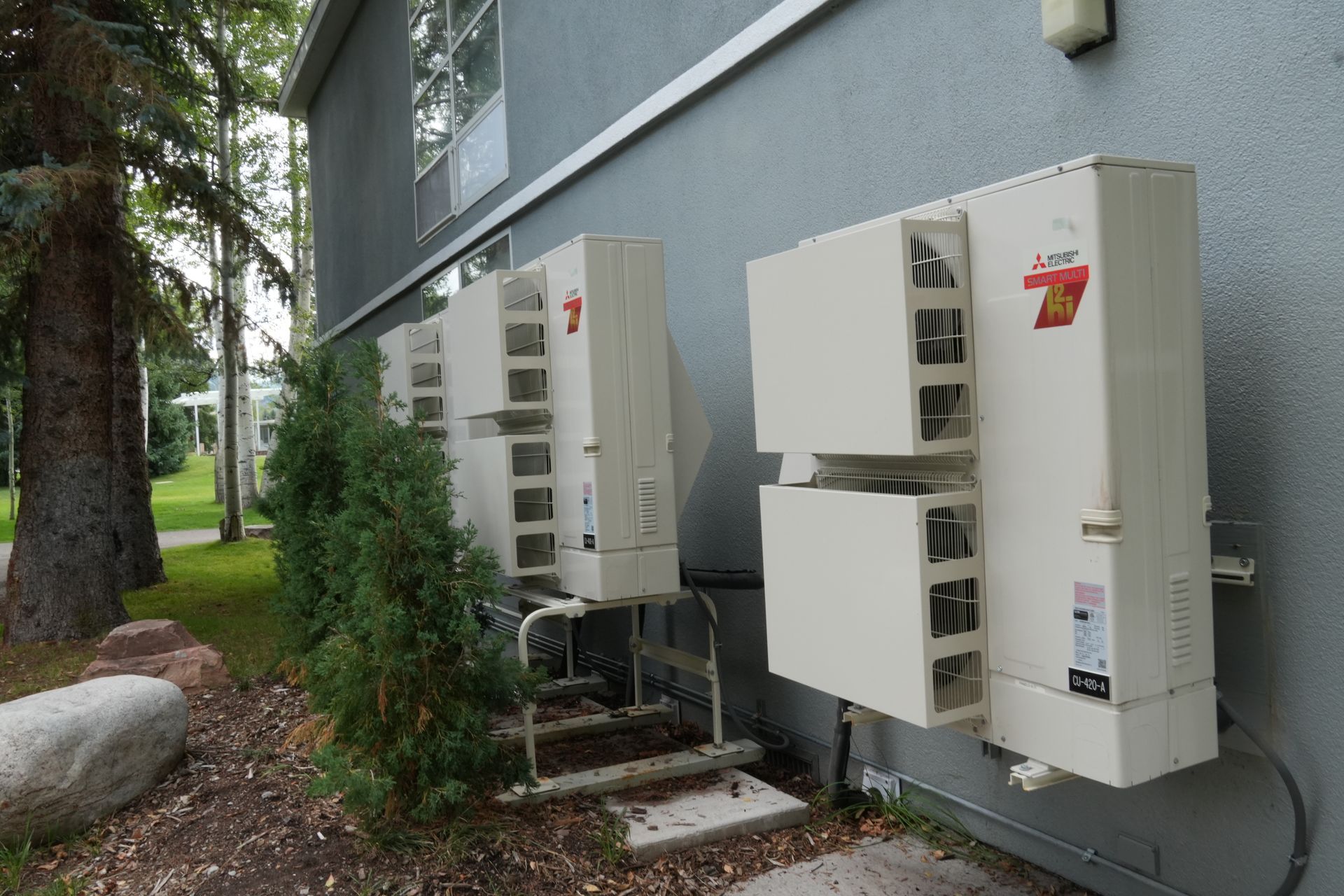 CORE staff member conducting a home energy assessment in Aspen, demonstrating their hands-on approach to climate solutions.