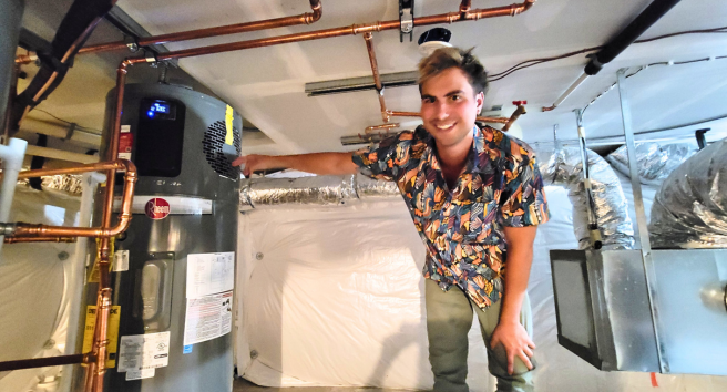 CORE staff member conducting a home energy assessment in Aspen, demonstrating their hands-on approach to climate solutions.