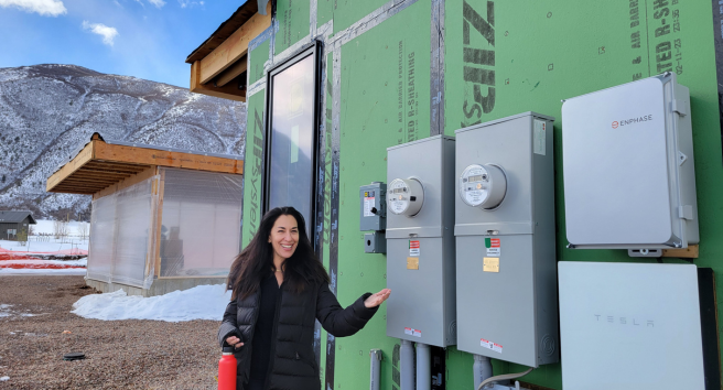 CORE staff member conducting a home energy assessment in Aspen, demonstrating their hands-on approach to climate solutions.