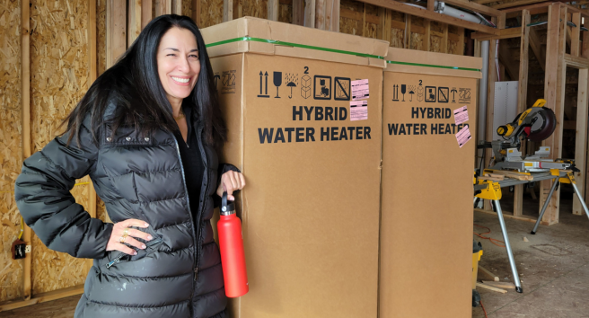 CORE staff member conducting a home energy assessment in Aspen, demonstrating their hands-on approach to climate solutions.