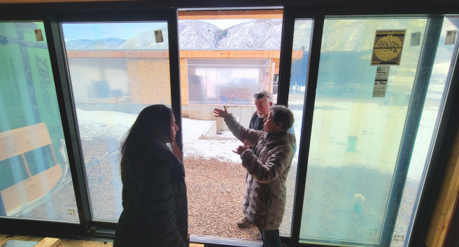 CORE staff member conducting a home energy assessment in Aspen, demonstrating their hands-on approach to climate solutions.