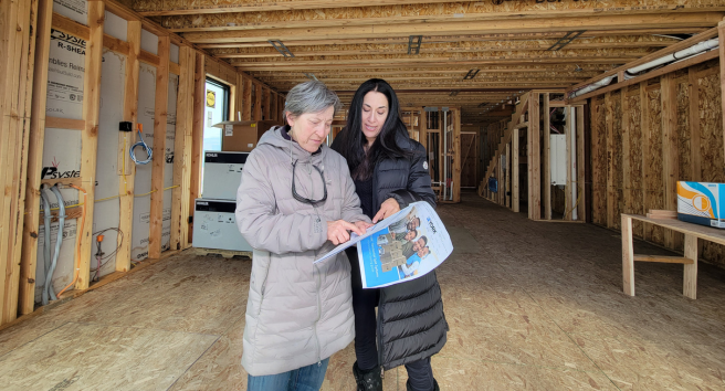 CORE staff member conducting a home energy assessment in Aspen, demonstrating their hands-on approach to climate solutions.