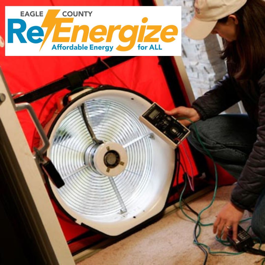 CORE staff member conducting a home energy assessment in Aspen, demonstrating their hands-on approach to climate solutions.