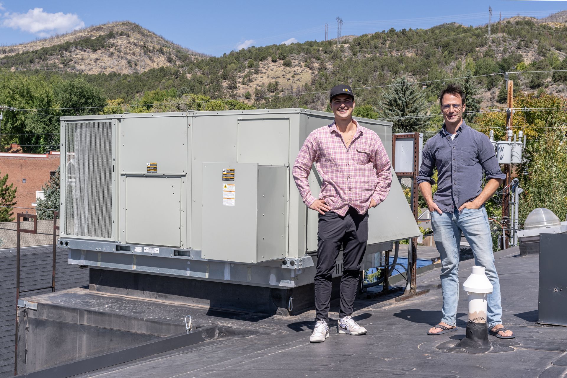 CORE staff member conducting a home energy assessment in Aspen, demonstrating their hands-on approach to climate solutions.