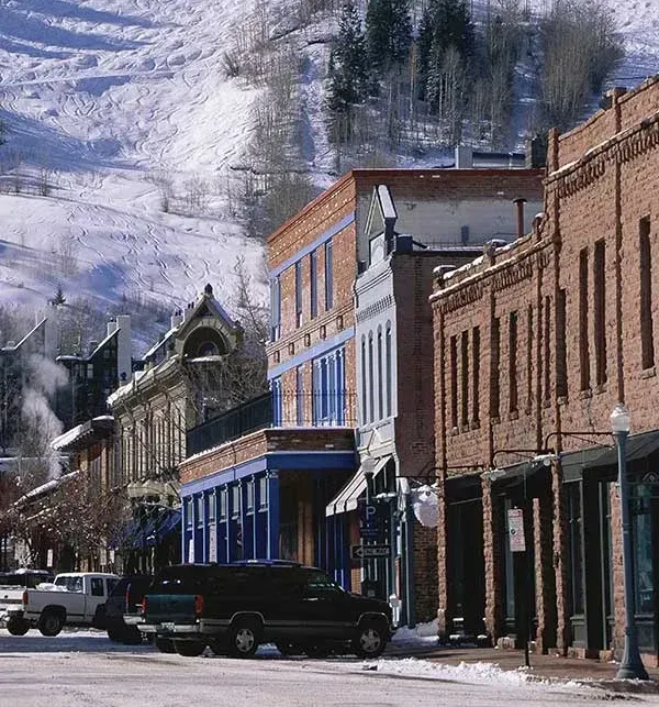 Aspen mountain landscape with snow-capped peaks, representing the natural environment CORE is working to protect in the Roaring Fork Valley.