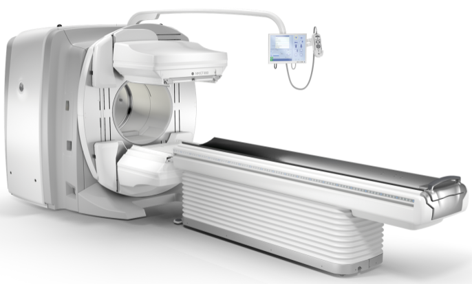 A ct scan machine with a monitor attached to it