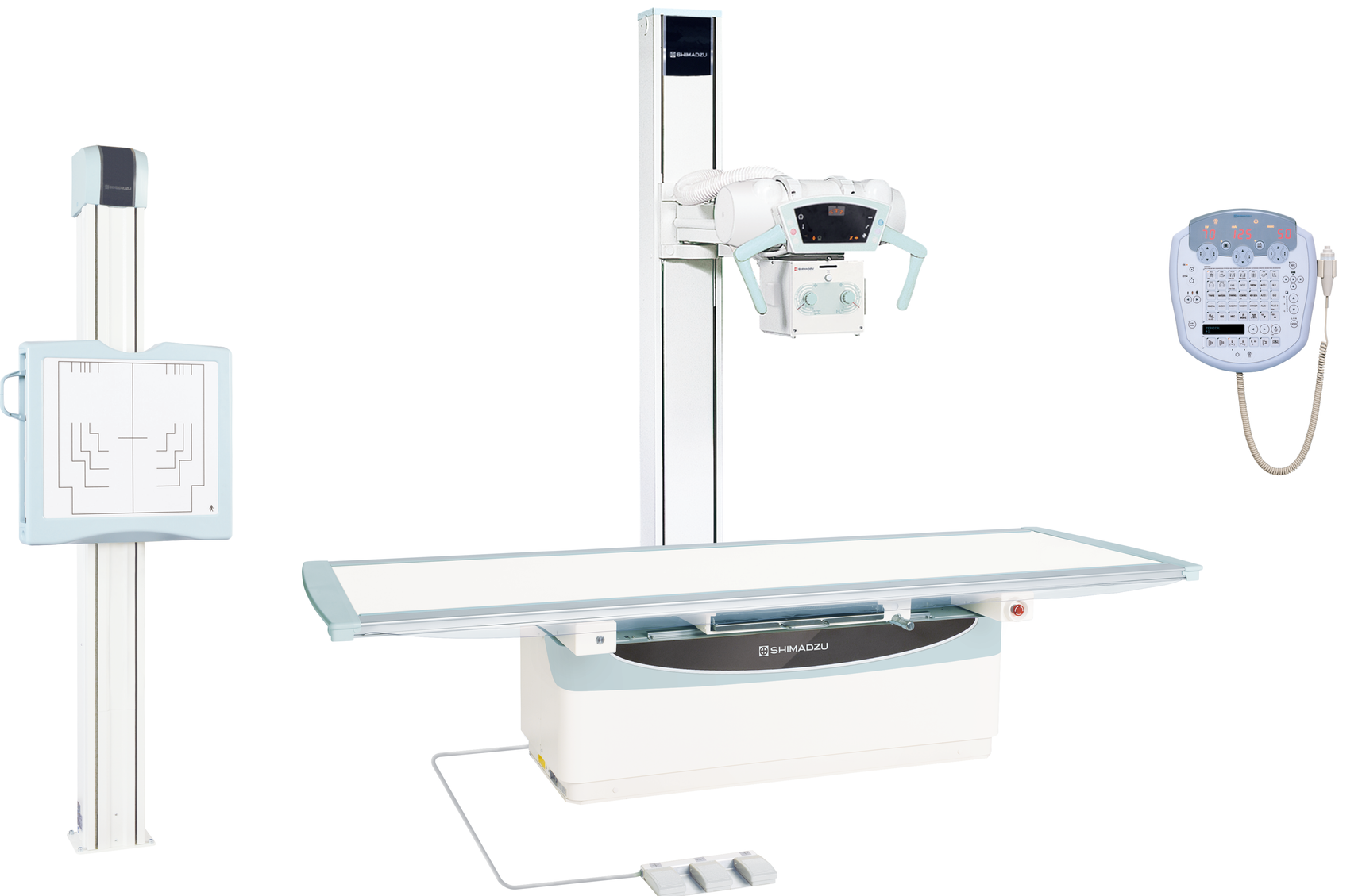 An x-ray machine is sitting on top of a white table.