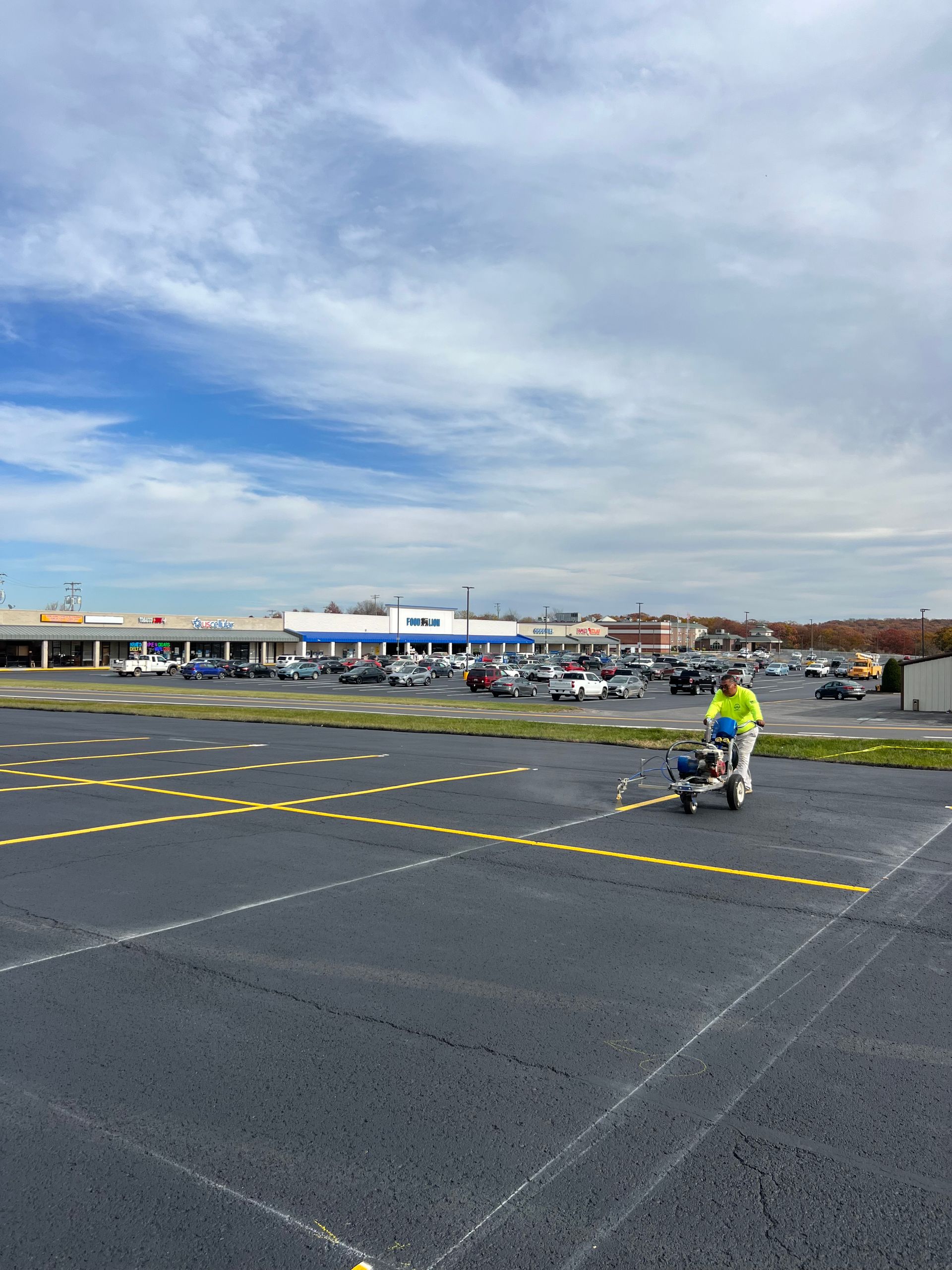 How to stripe parking lot? Picture showing Winchester Striping showing how to stripe a parking lot.