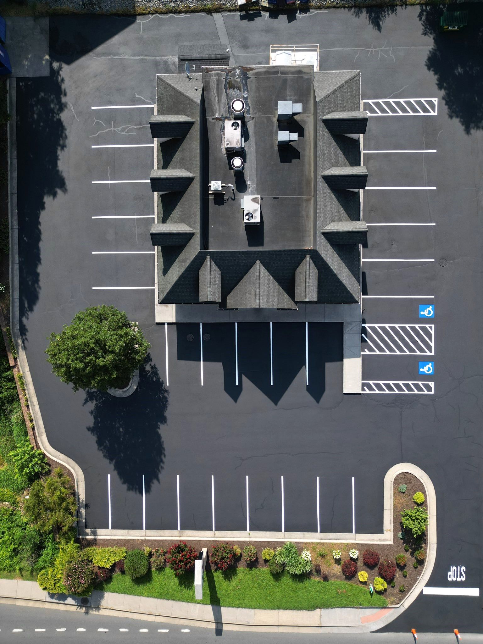 After picture of a parking lot with the parking area line paint.