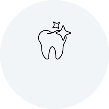 A white tooth with shine lines in a white circle.