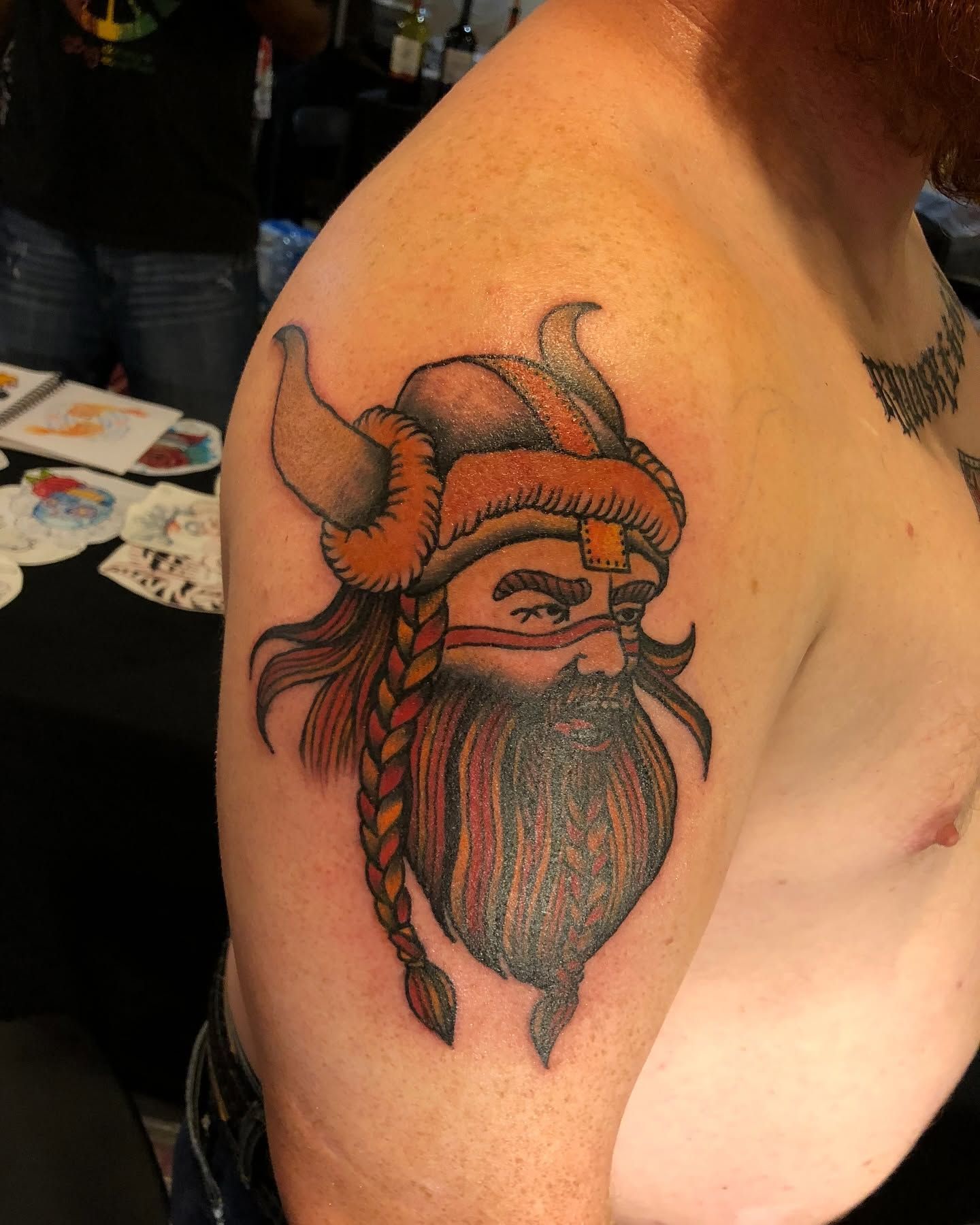 Tattoo by Eric Estrada at The Widow's Son Tattoo Co. in Gilbertsville, PA — a Norse warrior in colour on a shoulder