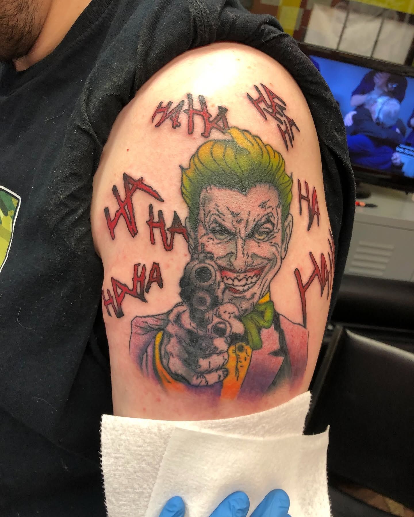 Tattoo by Eric Estrada at The Widow's Son Tattoo Co. in Gilbertsville, PA — a comic-style character in saturated colour on a shoulder