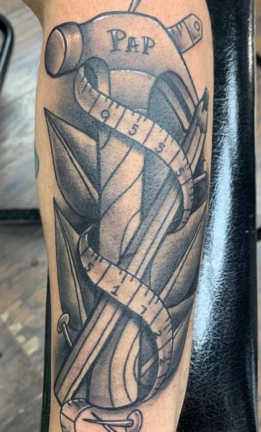 Tattoo by Tom Kelly at The Widow's Son Tattoo Co. in Gilbertsville, PA — a black and grey geometric piece