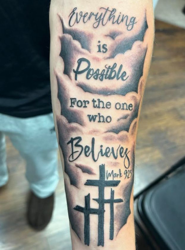 Tattoo by Tom Kelly at The Widow's Son Tattoo Co. in Gilbertsville, PA — script and clouds with a verse reference