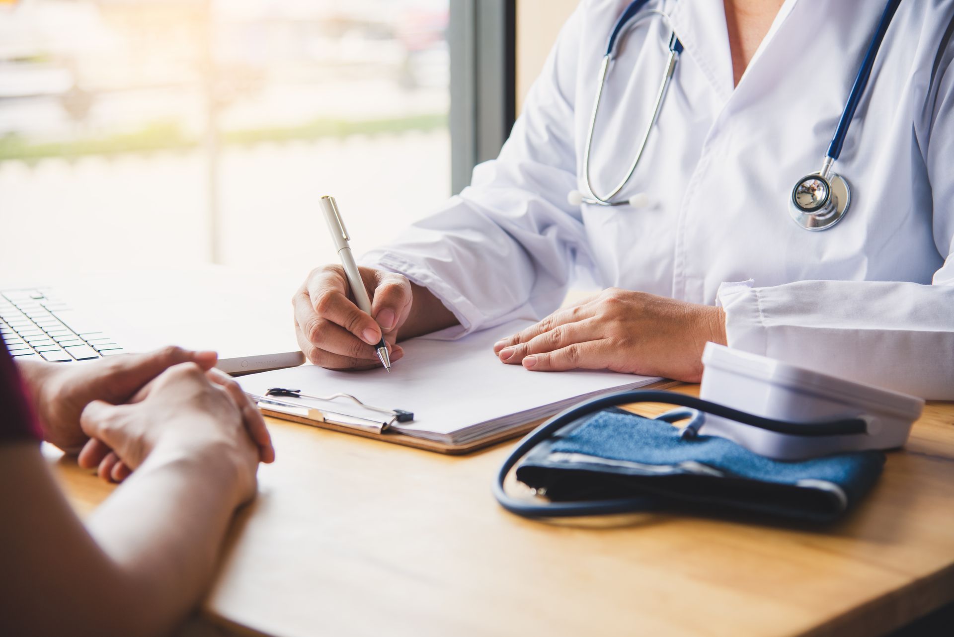 The doctor is discussing the results of the patient's physical examination and treatment guidelines.