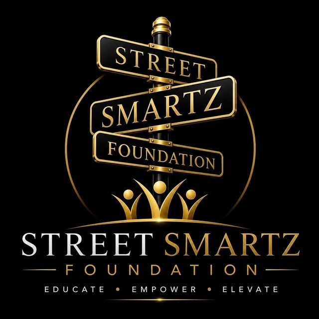 Street Smartz Foundation logo with gold and black signpost, crown, and tagline “Educate • Empower • Elevate”