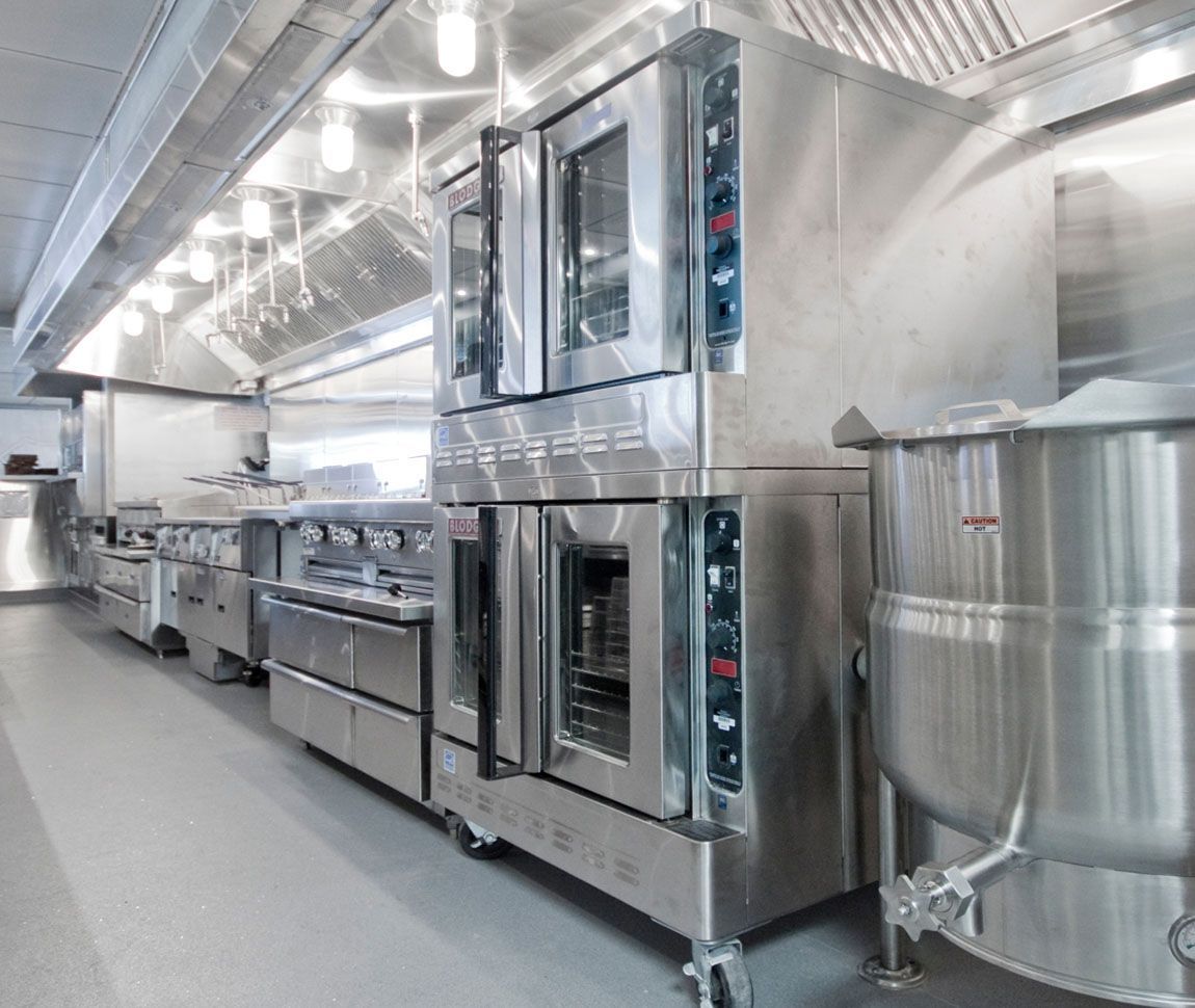 A kitchen with a lot of stainless steel appliances