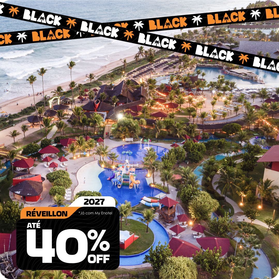 Vista aérea do resort Enotel mostrando a área de lazer com grandes piscinas, parque aquático e a praia ao fundo, com faixas de Black Friday e um selo de promoção com até 40% de desconto para pacotes de Réveillon de 2027
