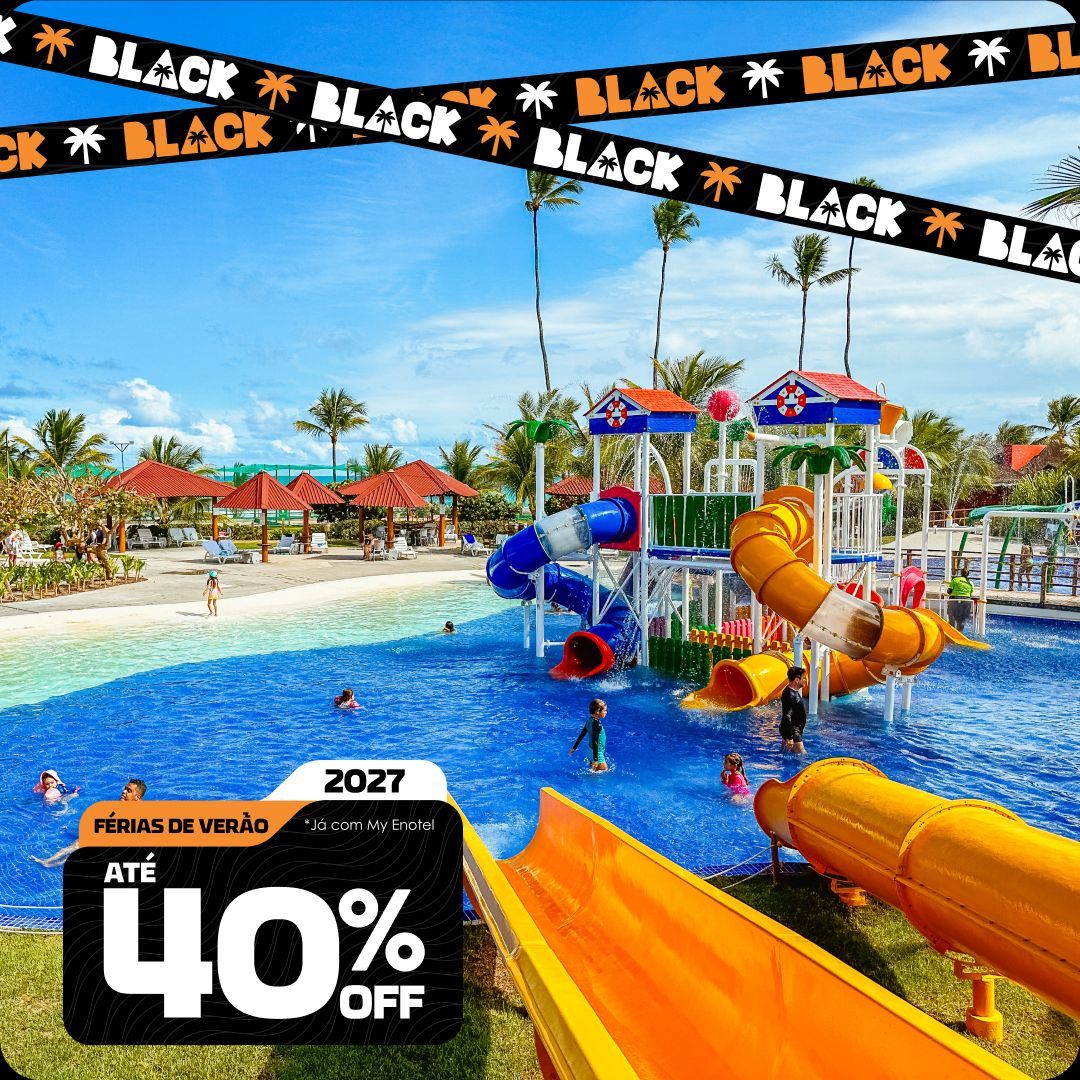 Crianças a divertirem-se num parque aquático colorido com escorregas e brinquedos numa piscina do resort, num dia de sol com céu azul e coqueiros. A imagem contém faixas de Black Friday e um selo promocional a anunciar as Férias de Verão em 2027 com até 40% de desconto no Enotel.