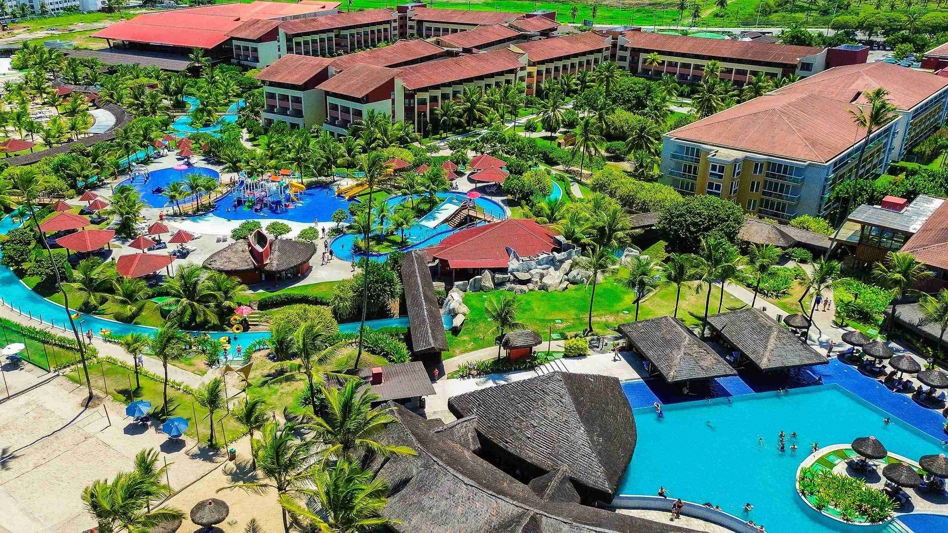 Megastructure of apartment blocks and the entire water complex with pools of Enotel Porto de Galinhas.