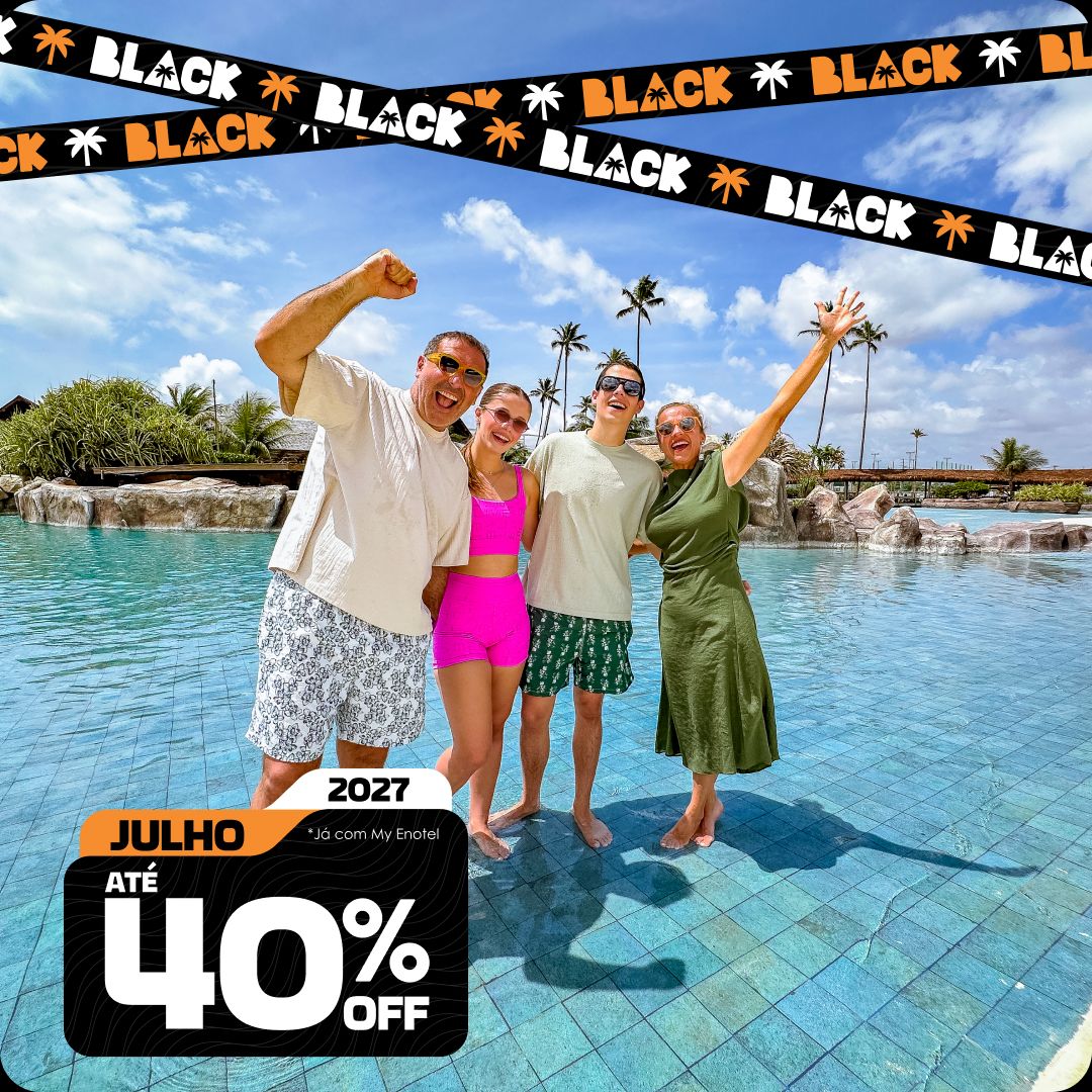 Menina sorrindo e acenando com os braços enquanto brinca em uma boia amarela no rio lento do resort Enotel, em um dia ensolarado. A imagem contém o selo da promoção My Black com até 40% de desconto para reservas em outubro de 2027.