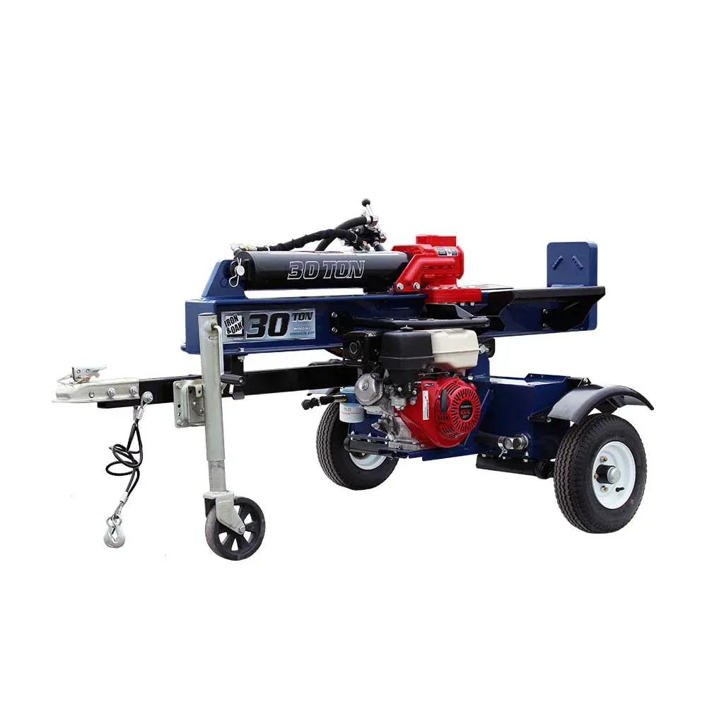 A log splitter is sitting on a trailer with wheels.