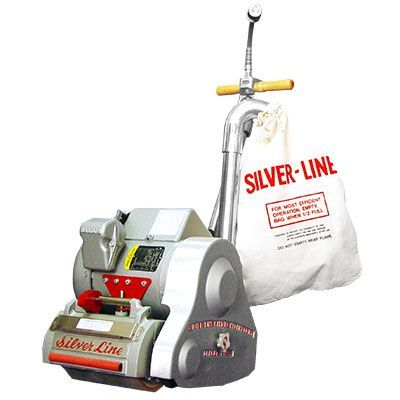 A silver line machine with a bag attached to it