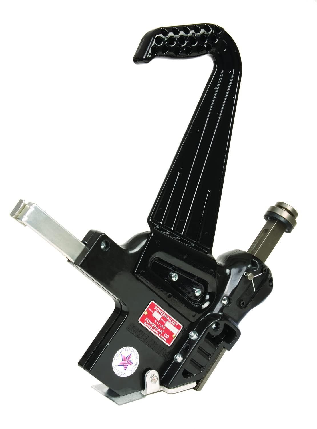 A black tool with a red star on it is on a white background.