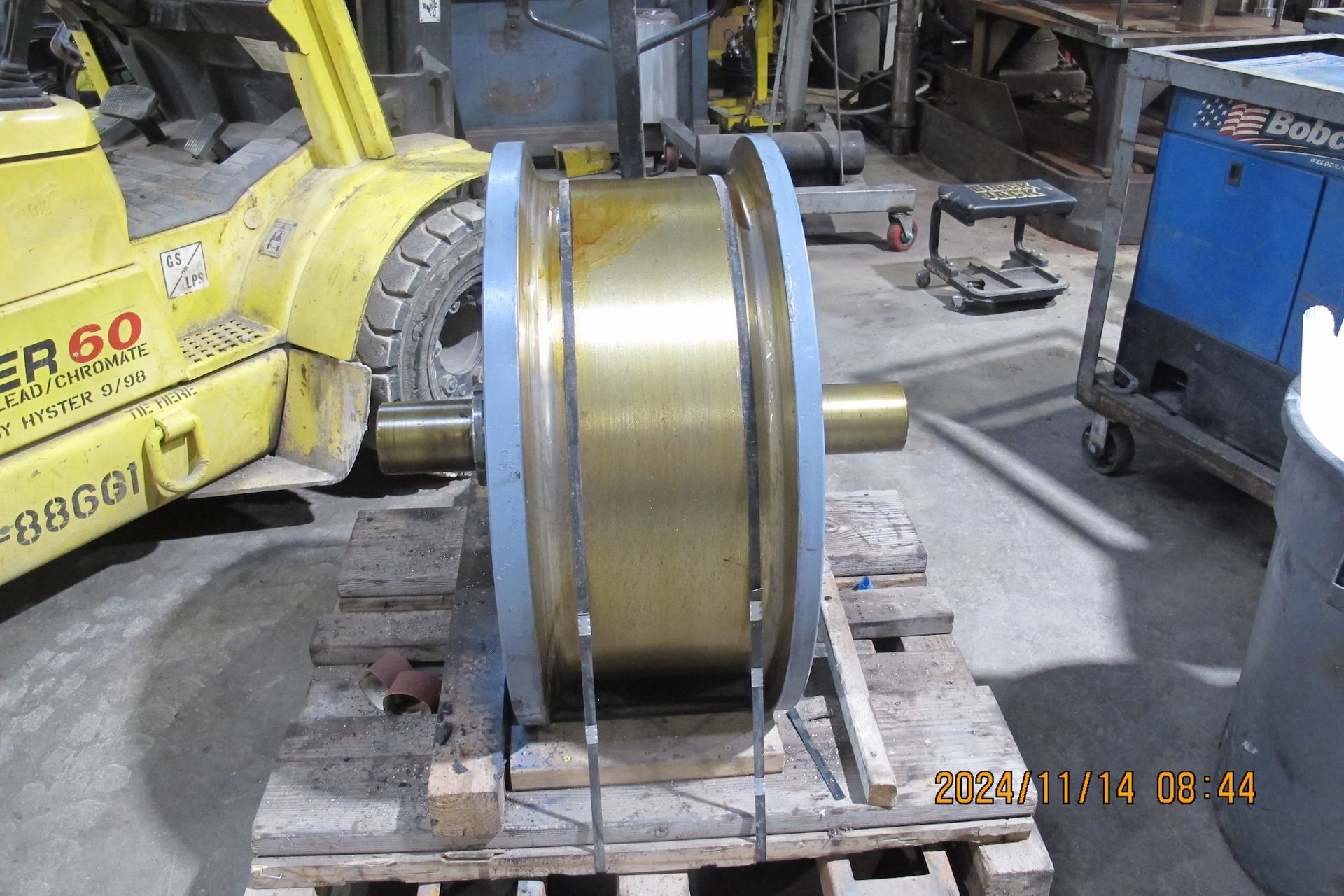 A yellow forklift with the number 60 on it