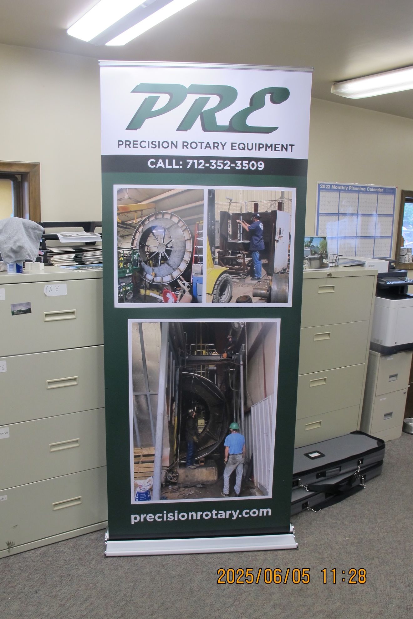 A banner that says prc on it in a room