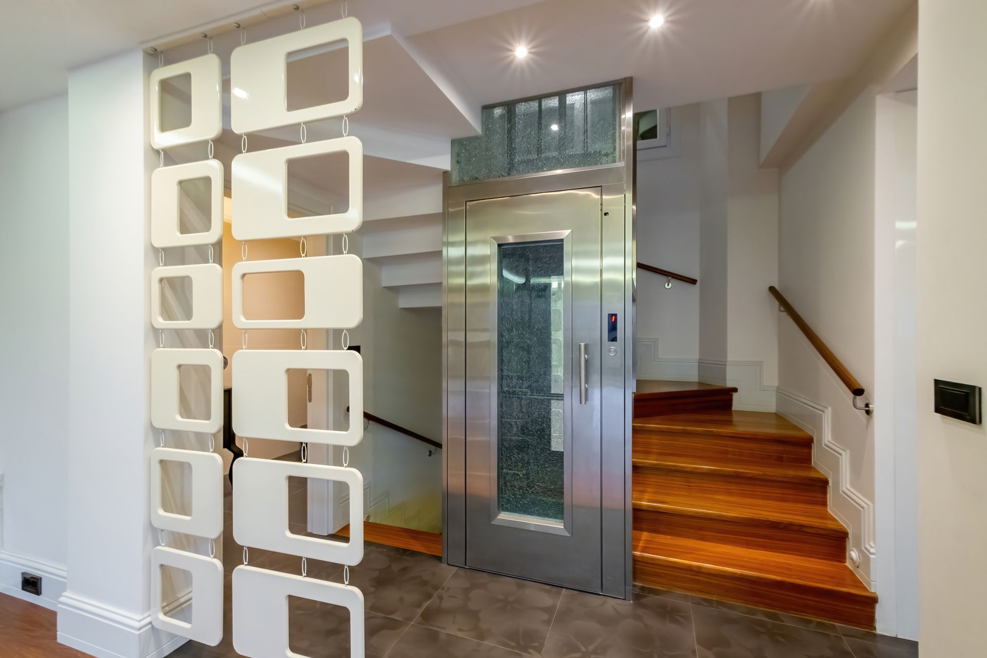 A Room With Stairs and an Elevator in It