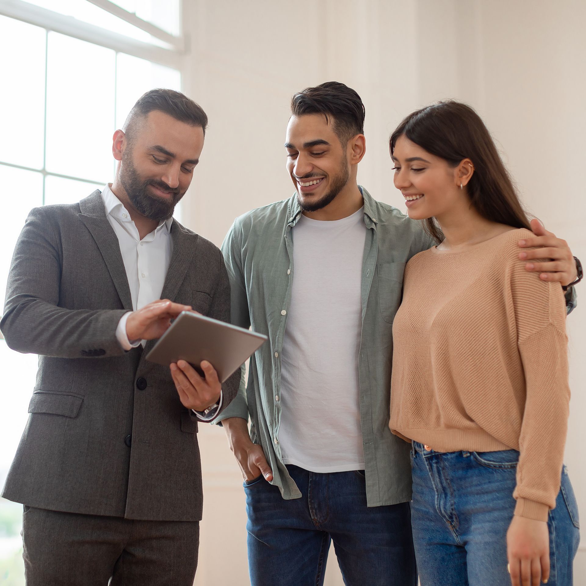 Couple Talking to Their Real Estate Agent Couple Talking to Their Real Estate Agent