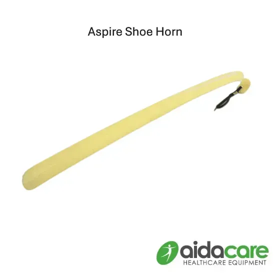 Yellow Aspire shoe horn with black loop, shown on a white background