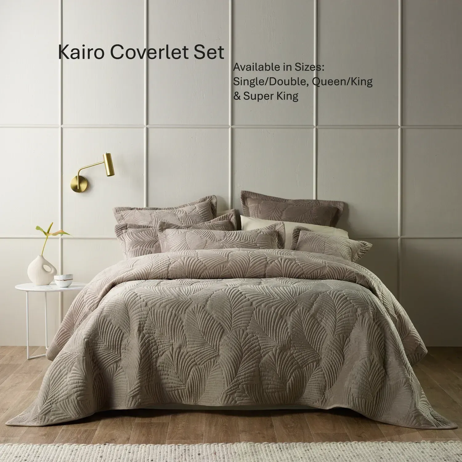 Taupe textured bedding set on a neatly made bed in a minimalist bedroom