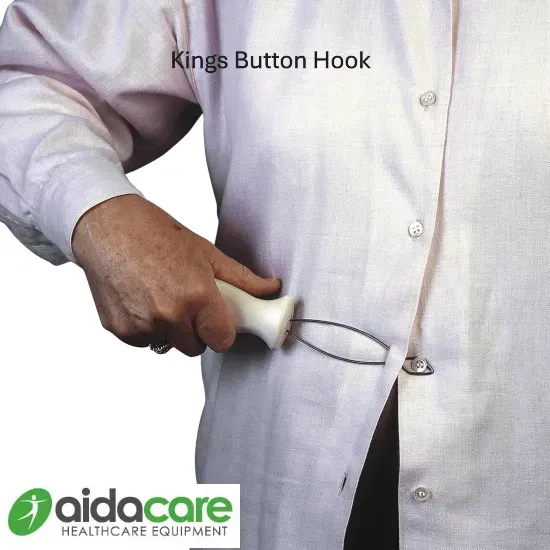 Hand using a button hook to fasten a shirt button