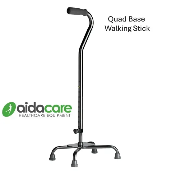 Black quad-base walking stick with curved handle on a white background.