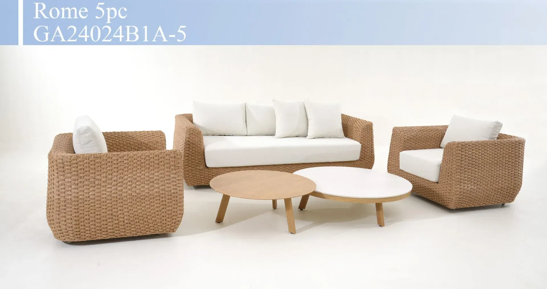 Outdoor wicker patio furniture set with white cushions, round coffee tables, and matching chairs on a white background
